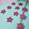 Passante Acrílico Estrela Rosa Glitter- 5un